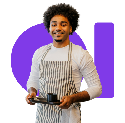 A friendly cafe waiter serving a cup of coffee